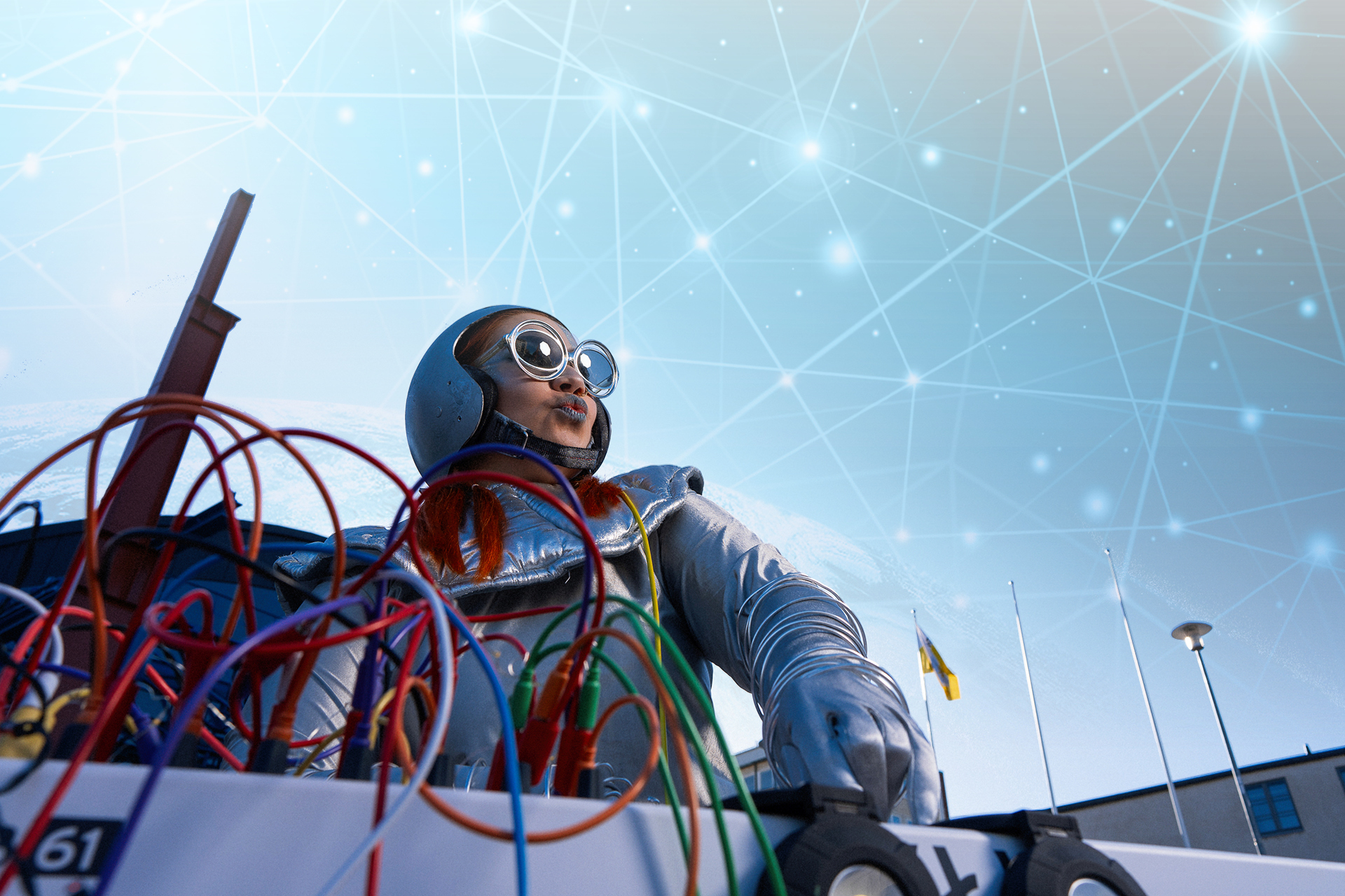 Futuristinen kuva, jossa henkilö on sähkölaitteen äärellä.