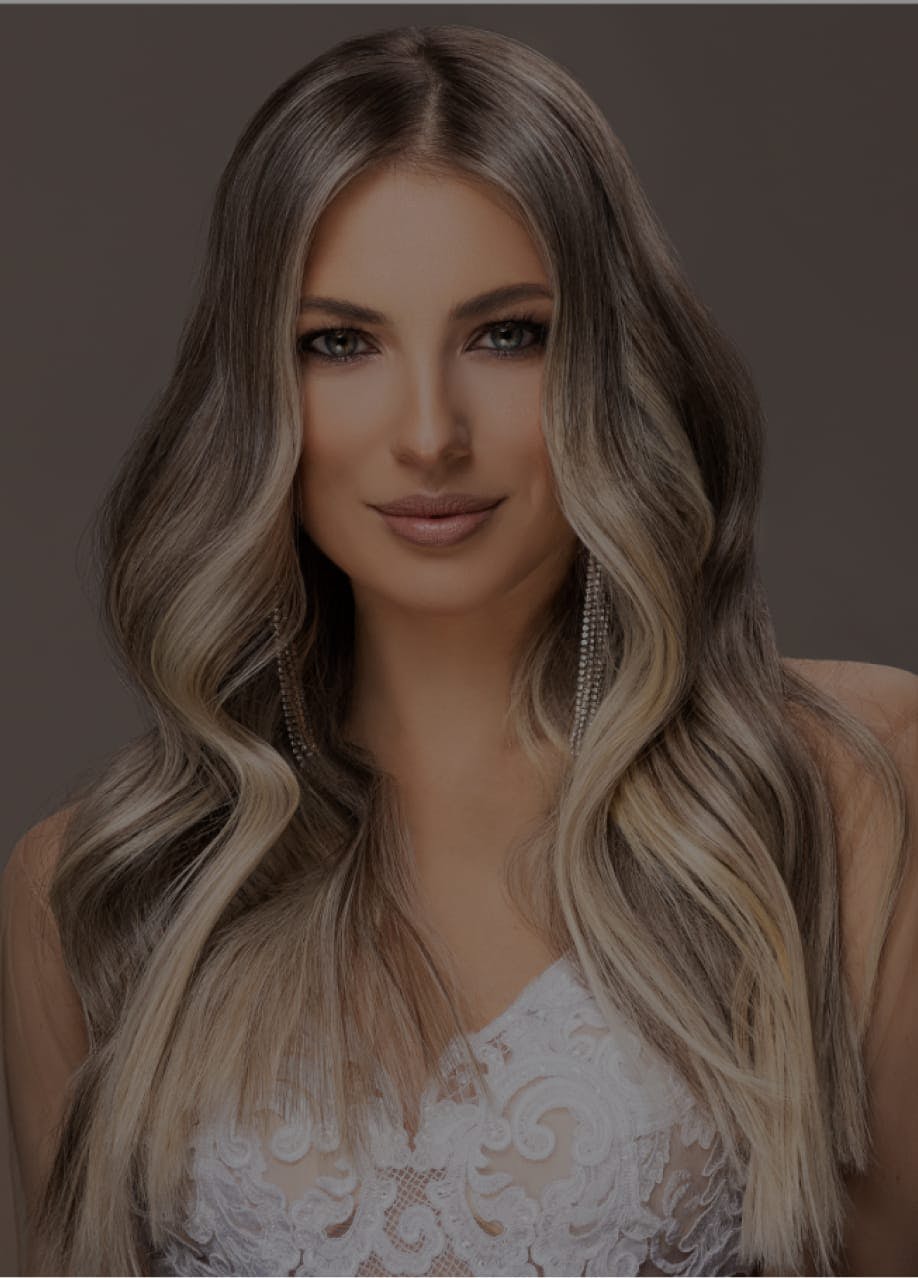 Beautiful woman with long hair wearing makeup