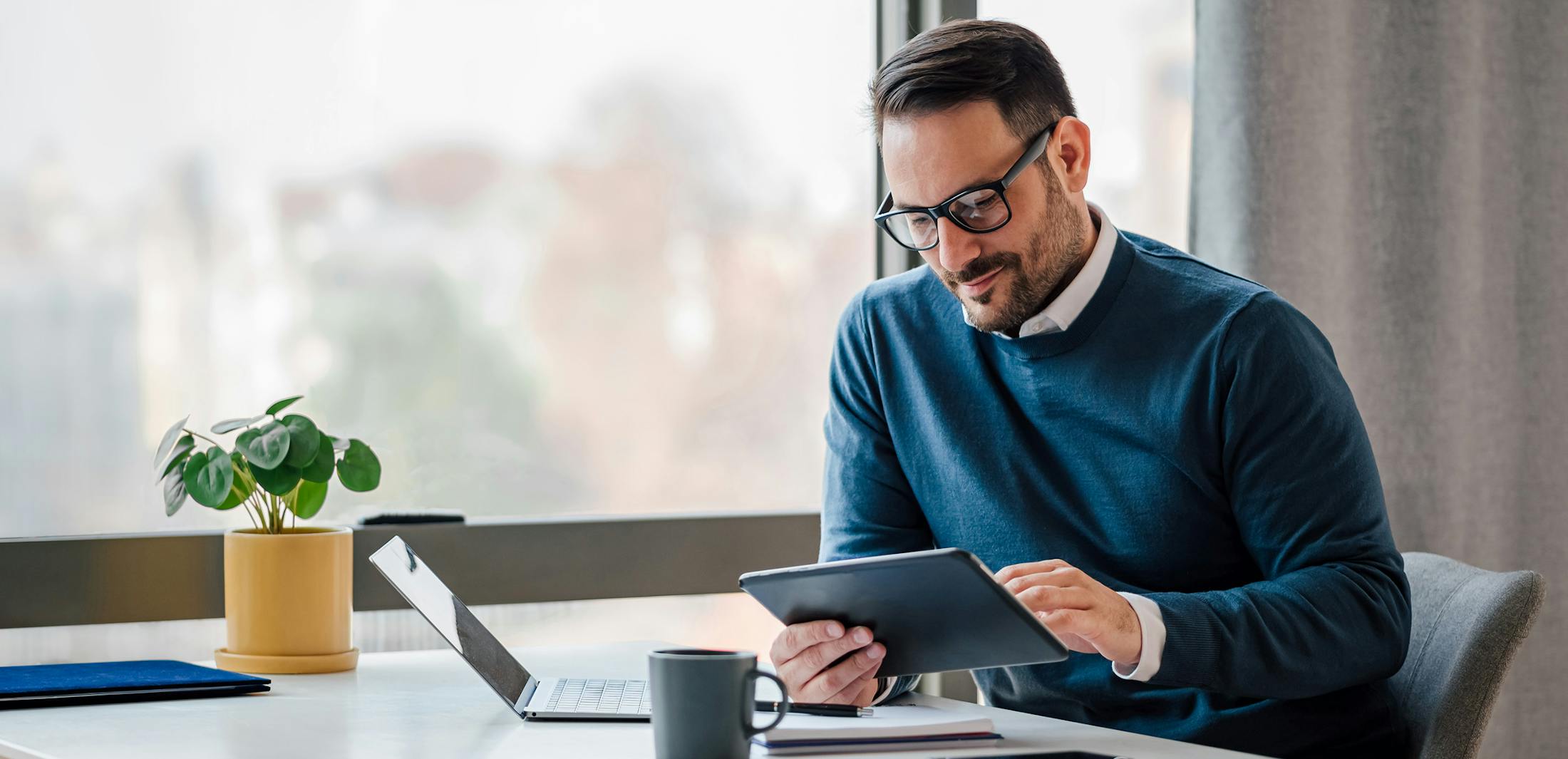 man sitting at a desk