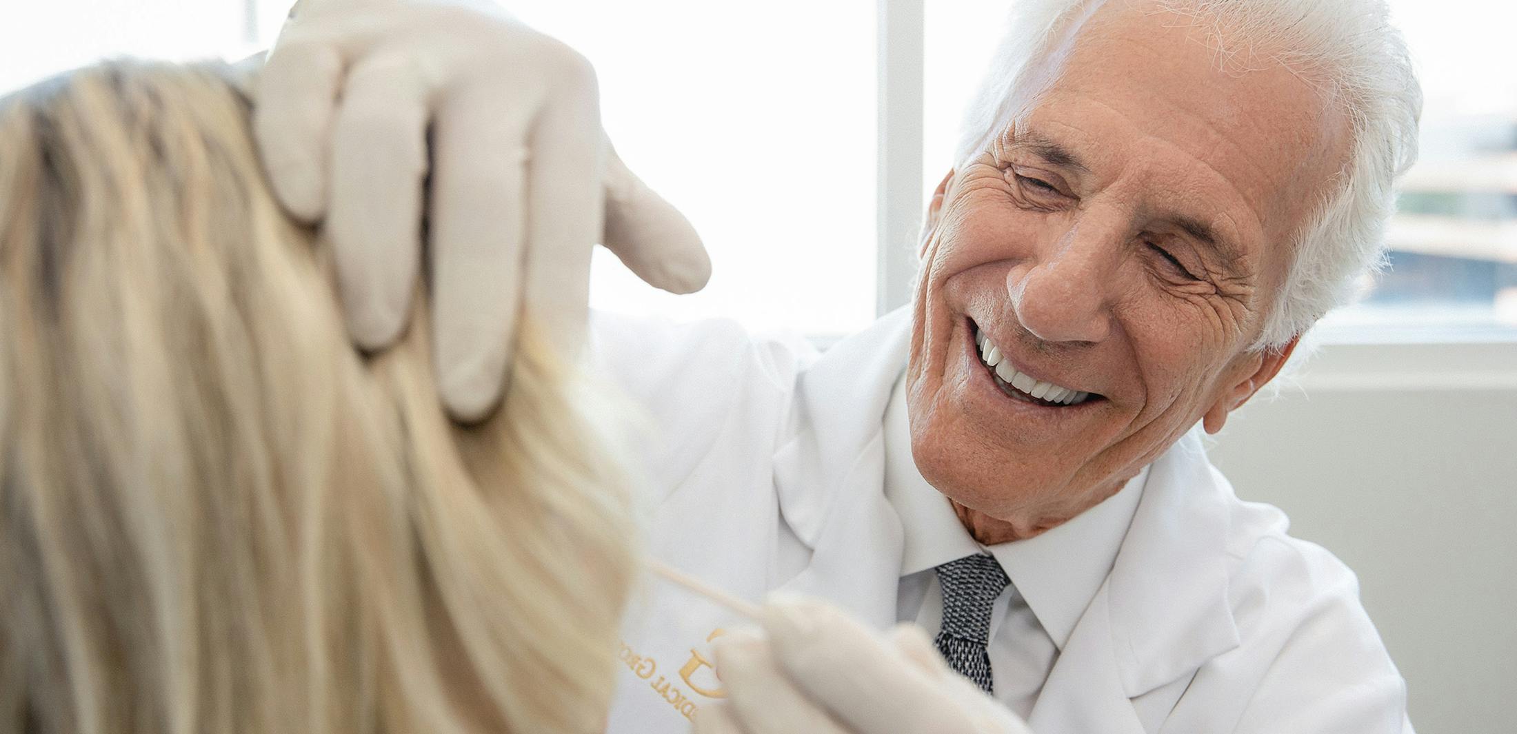 Dr. Greco with a female patient