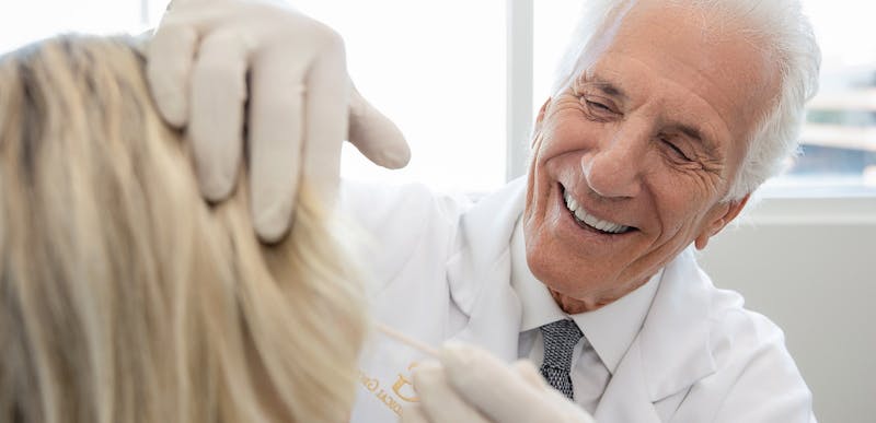 Dr. Greco with a female patient