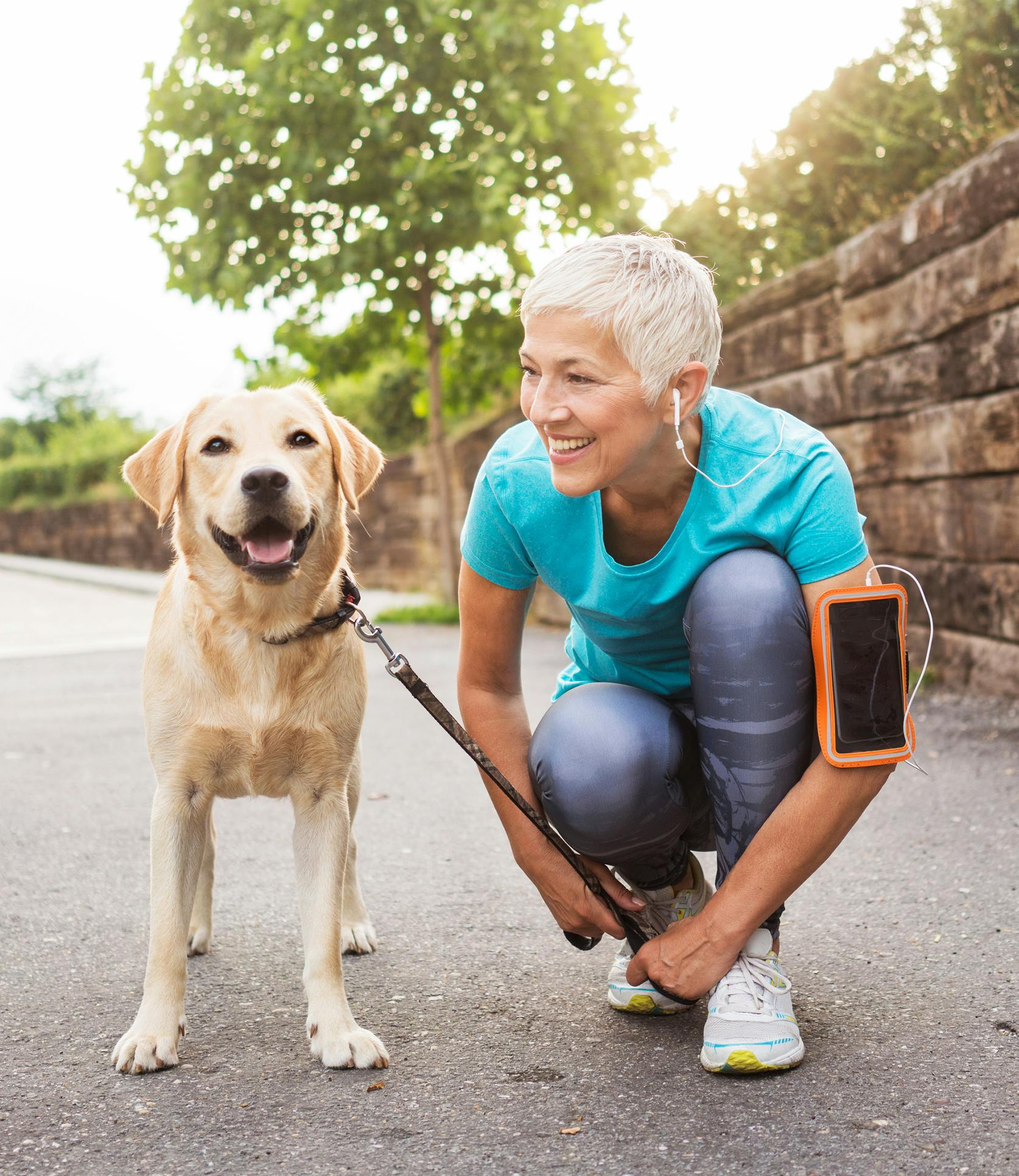 woman walking with a dog