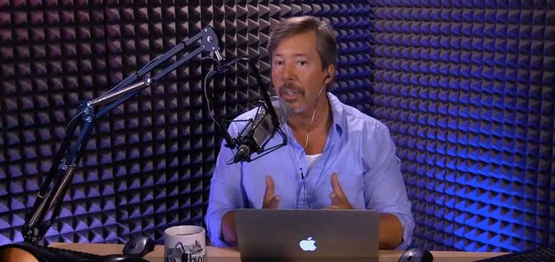 man talking into a microphone