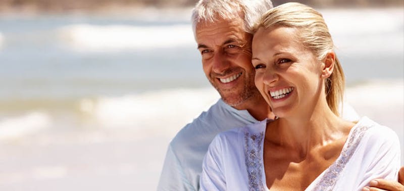 man and woman smiling