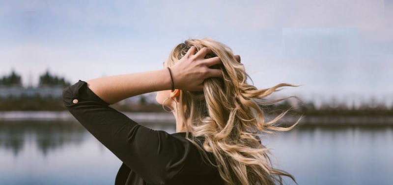 woman with her hair blowing in the wind