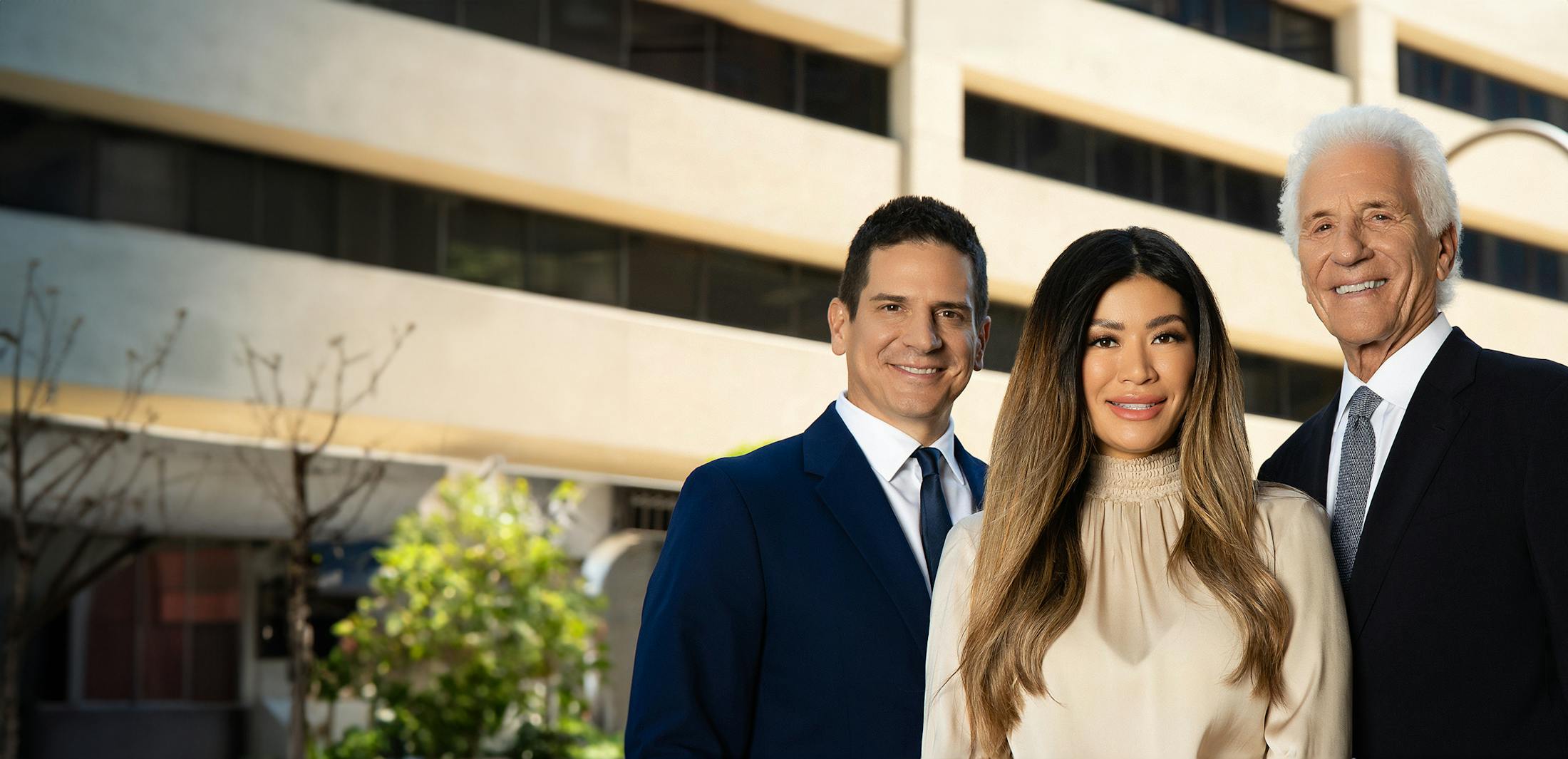 Dr. Greco, Dr. Greco Jr., and Vicky Greco