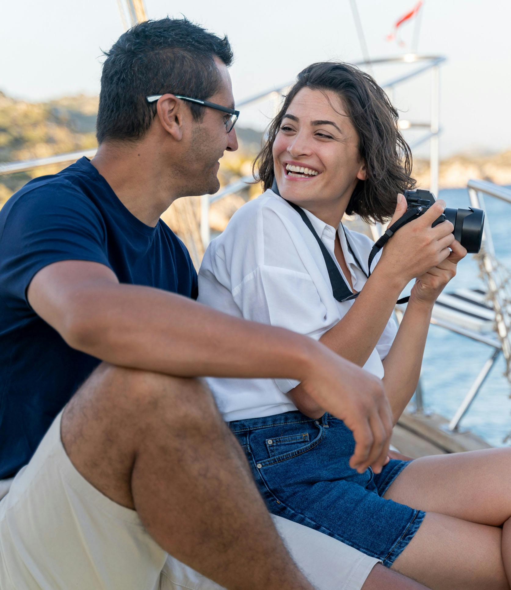 man and woman smiling at each other