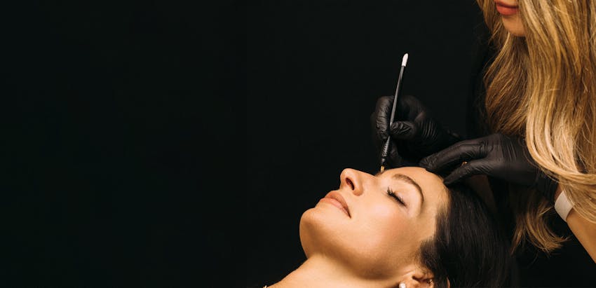 woman getting microblading