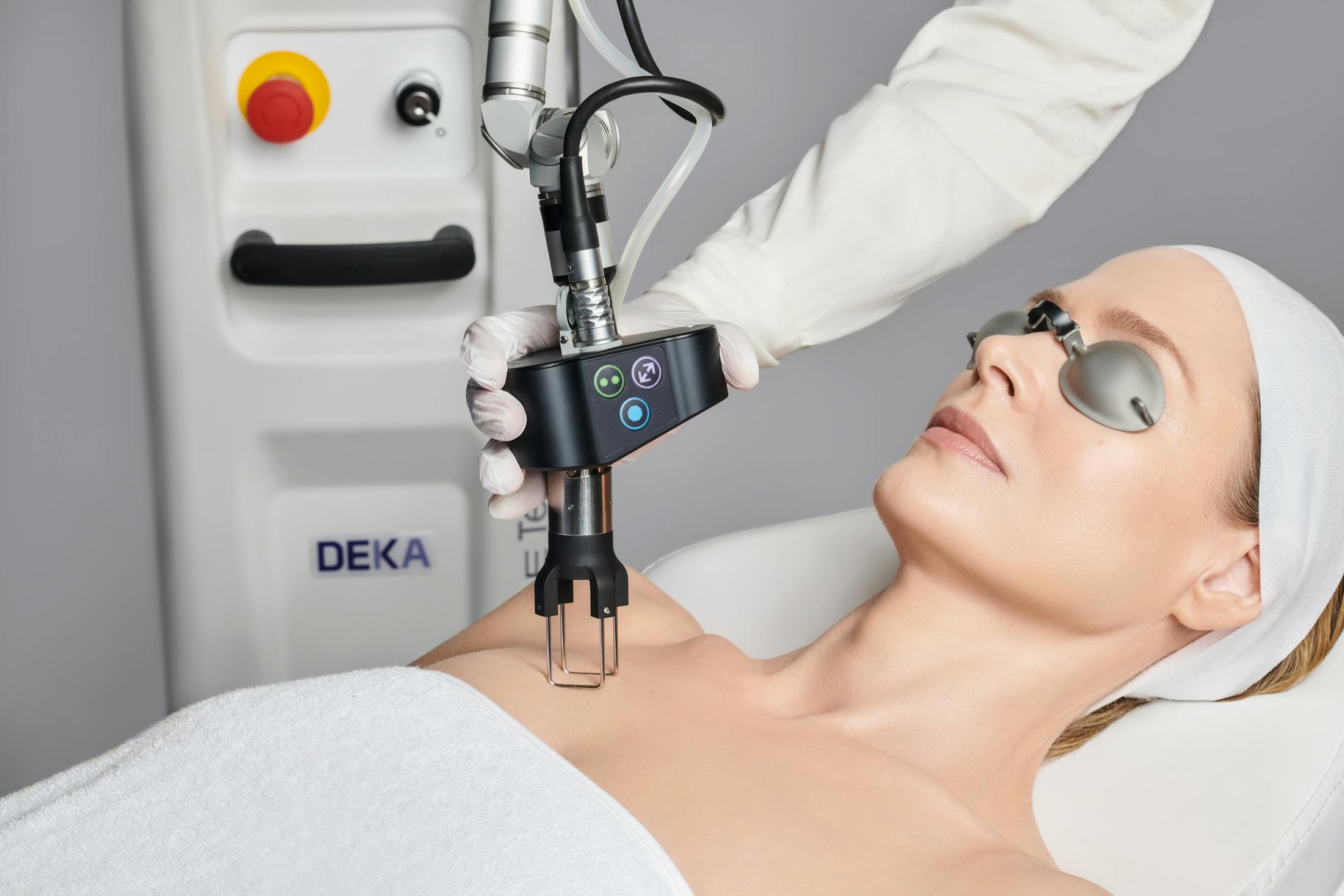 woman getting laser treatment on her chest