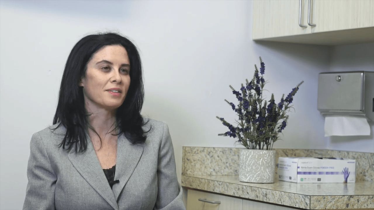 Woman sitting in doctors office