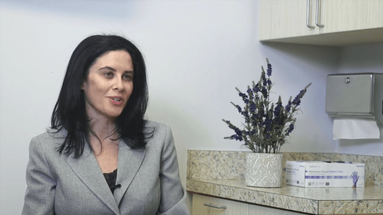 Woman sitting in doctors office