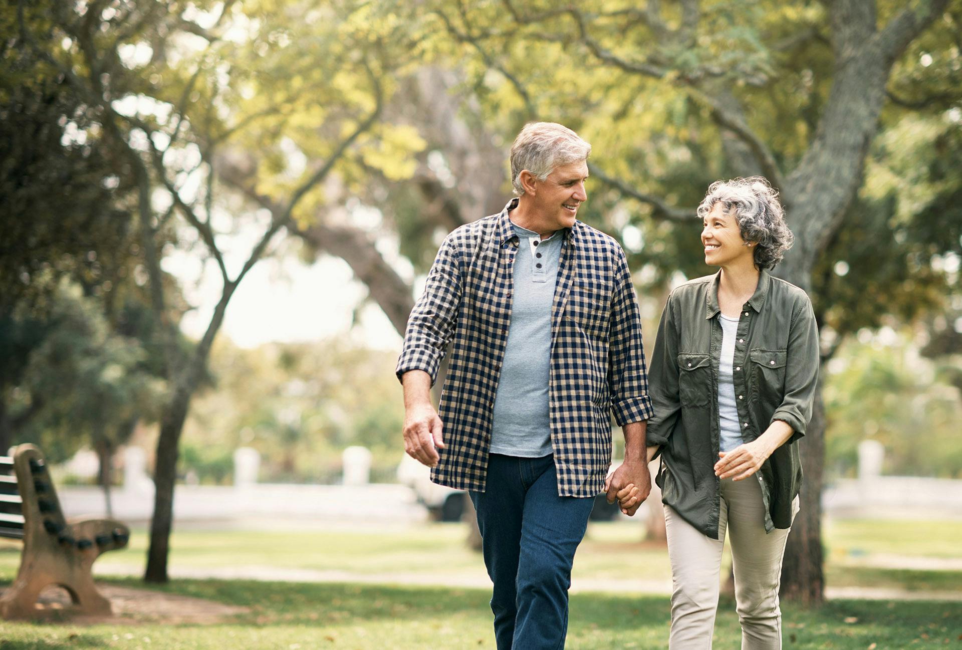 Couple walking in park