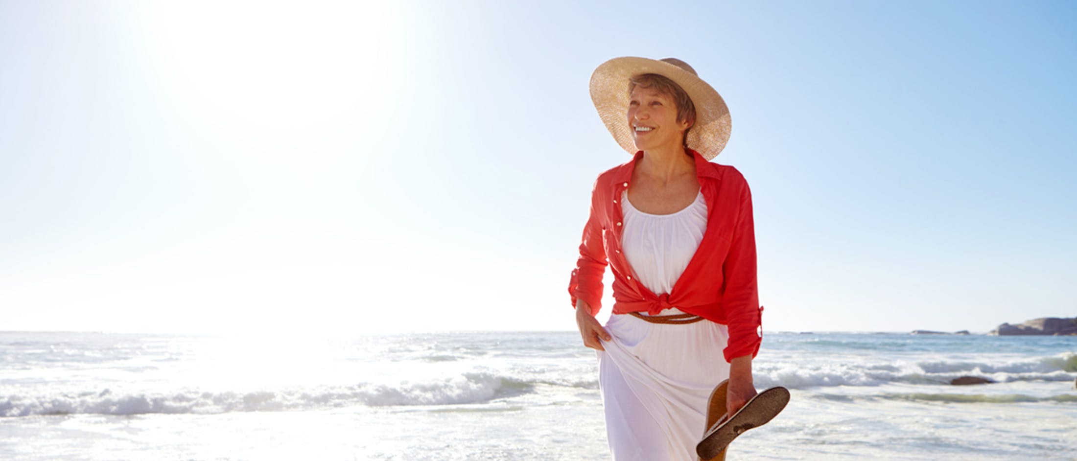 Woman walking on beach