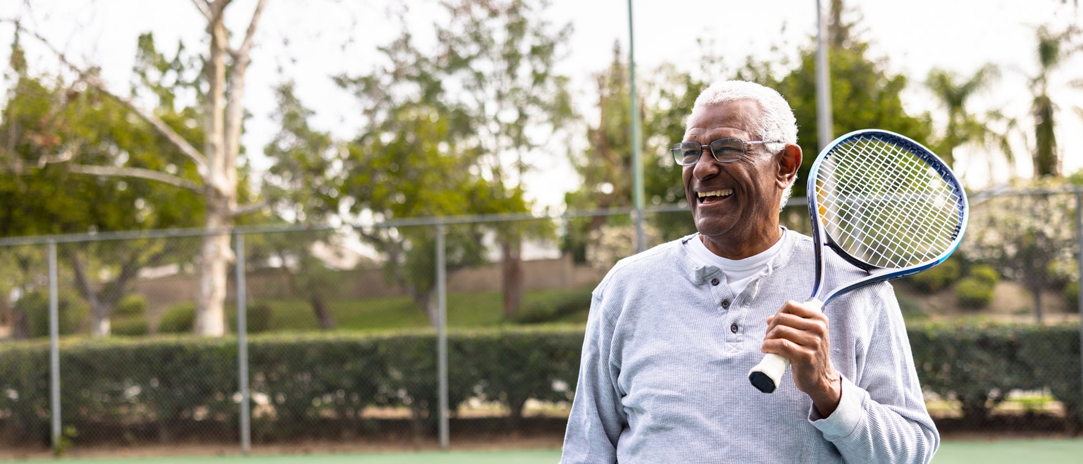 Man holding a tennis racket