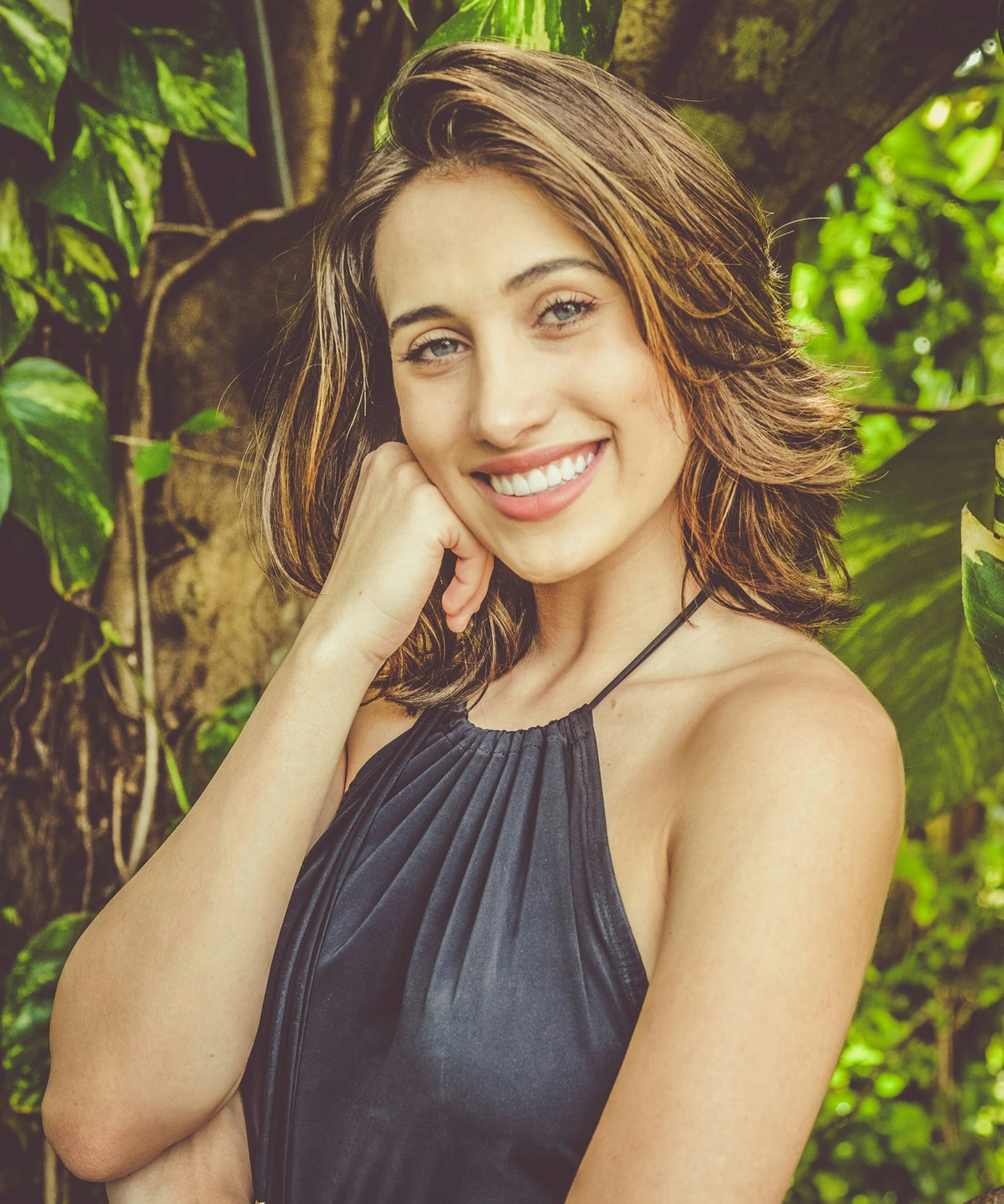 Woman wearing black halter top outside