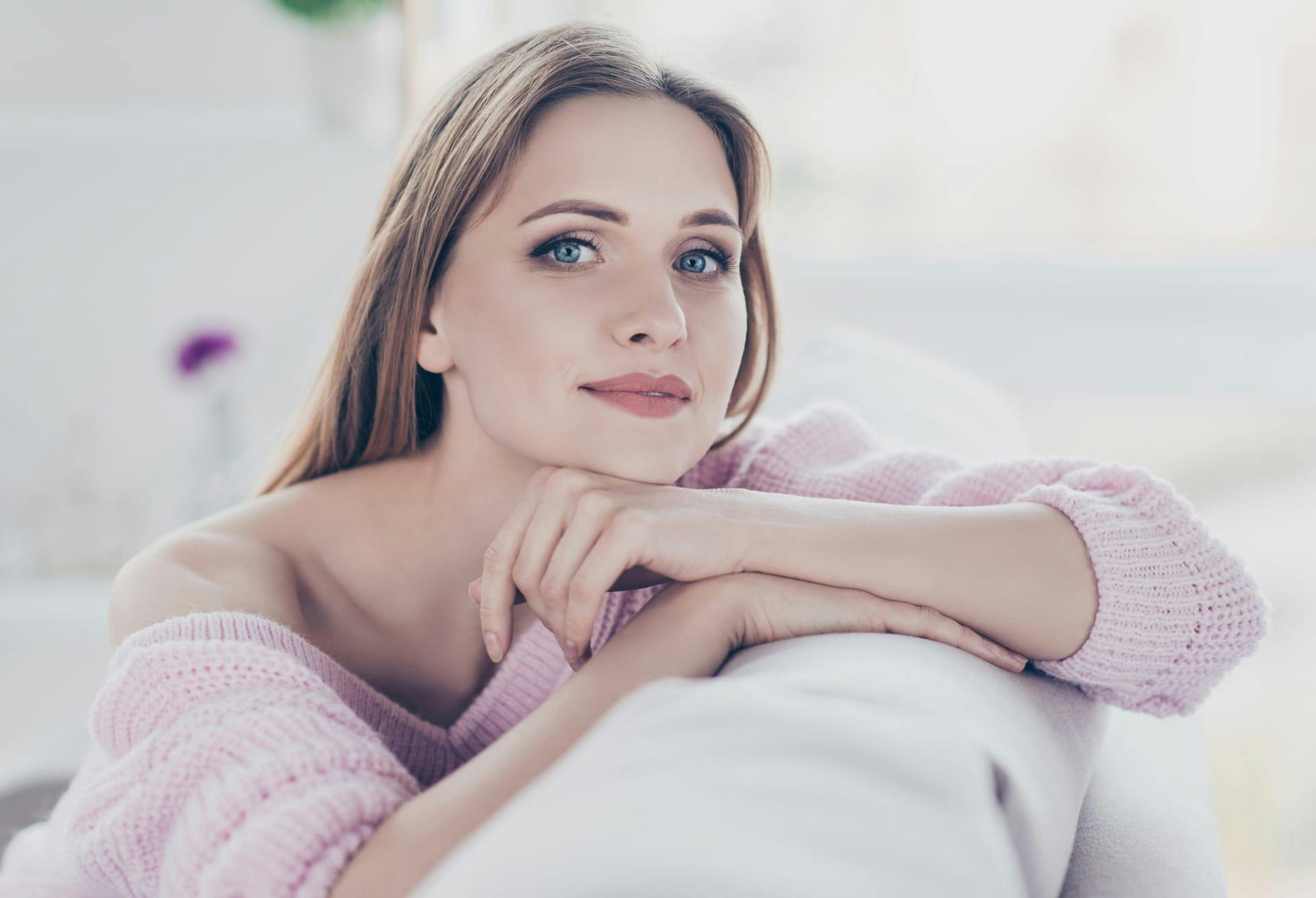 Woman in pink knitted sweater
