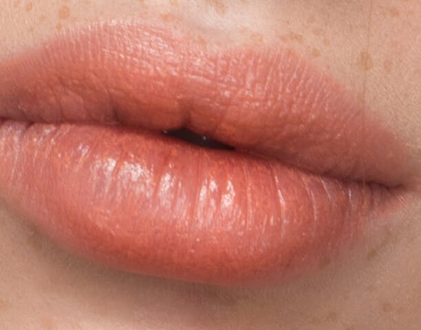 close up image of woman's lips