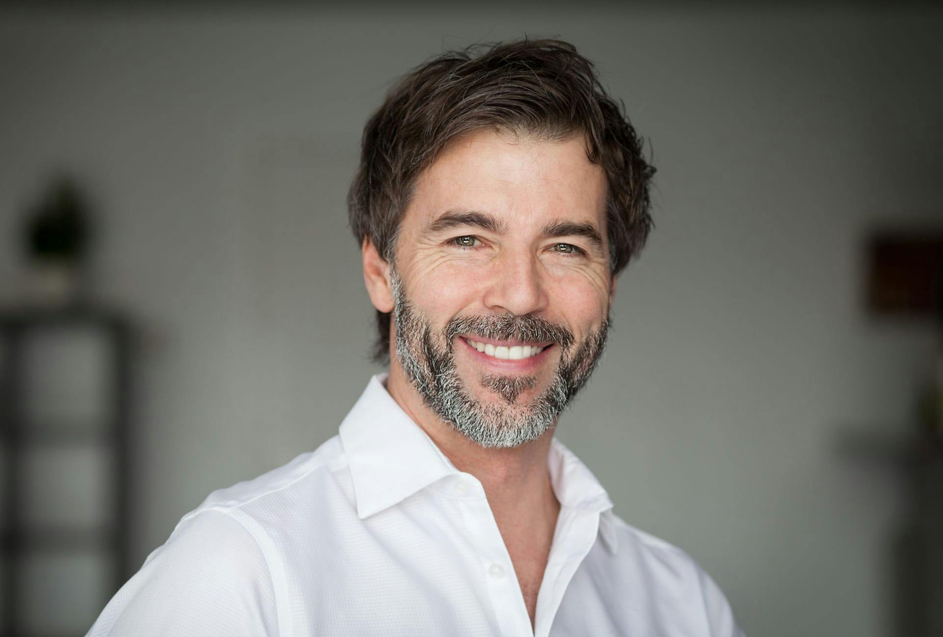 Handsome older man with salt and pepper facial hair