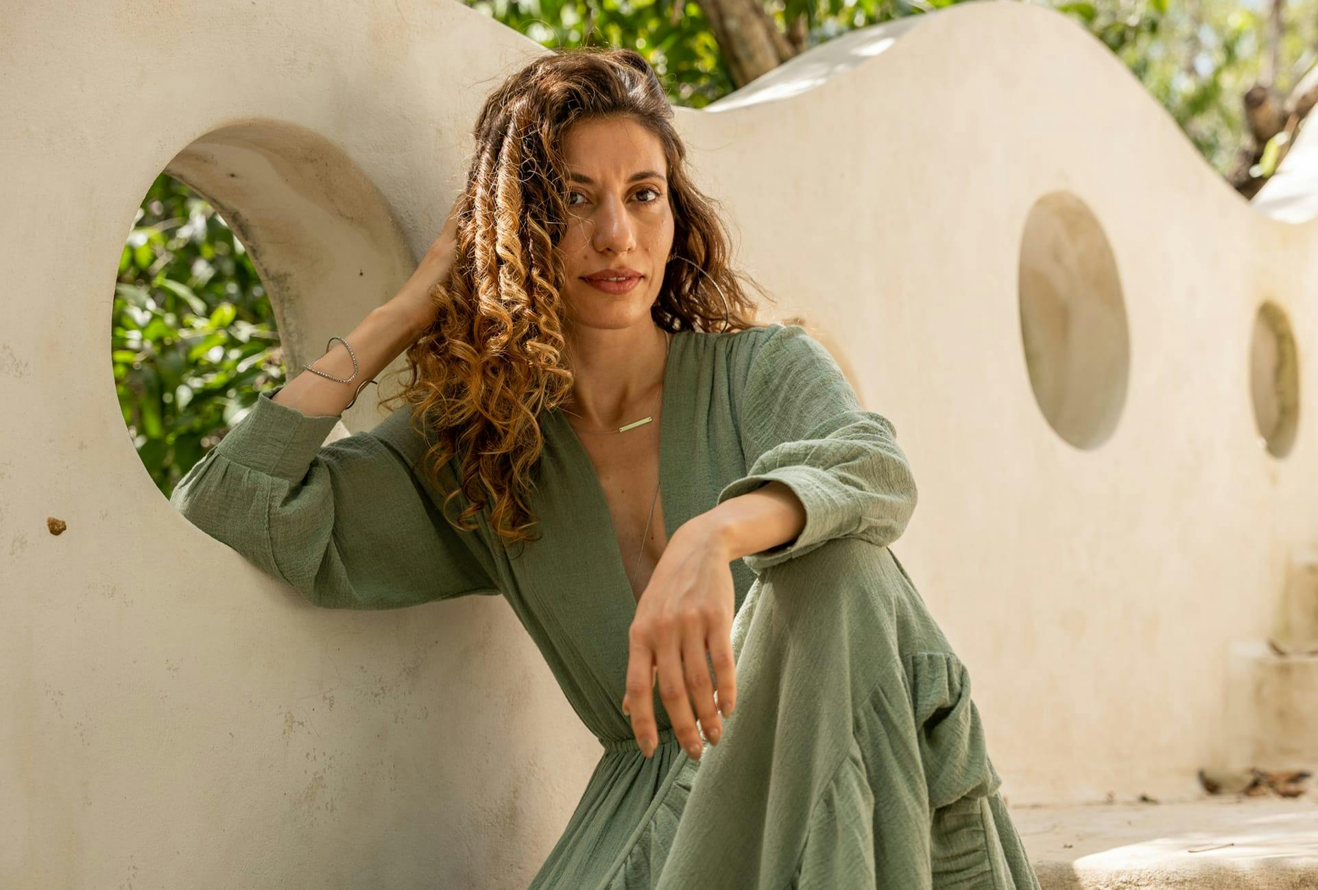Woman in a long green dress