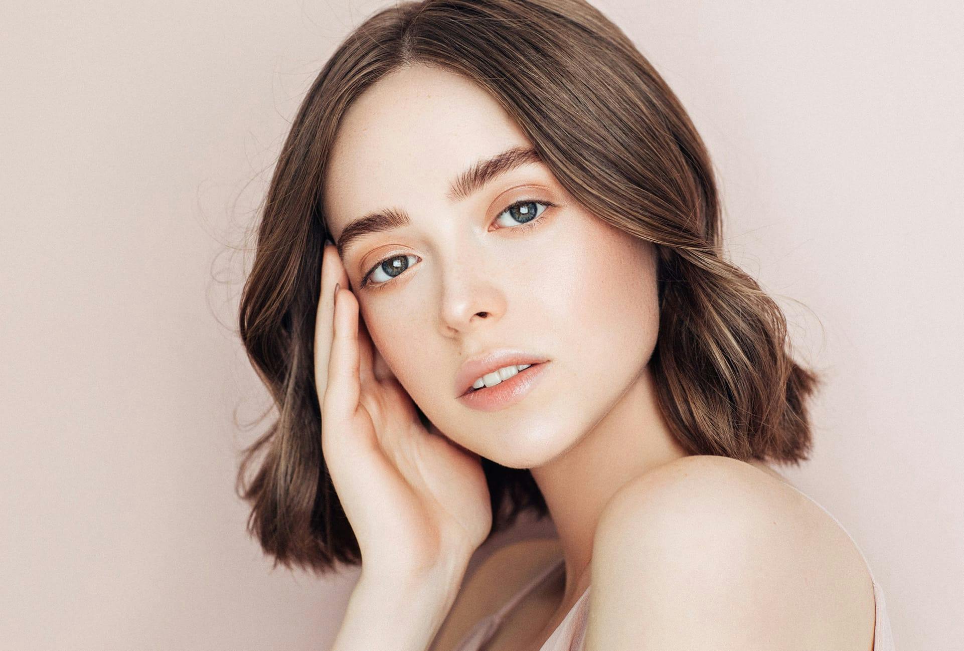 Woman with brown shoulder length hair