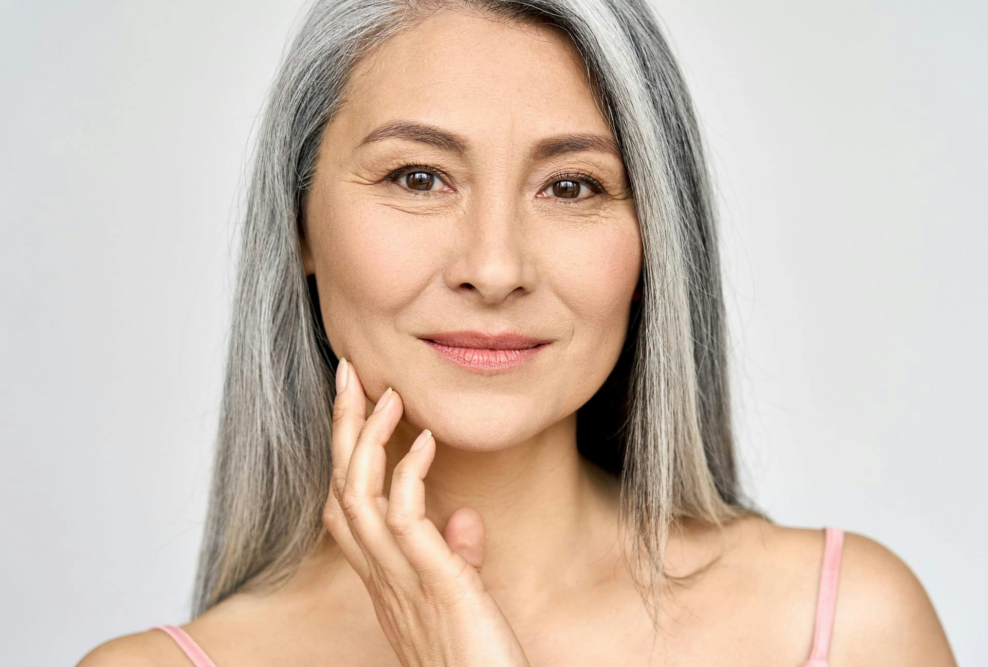 Woman with long salt and pepper hair
