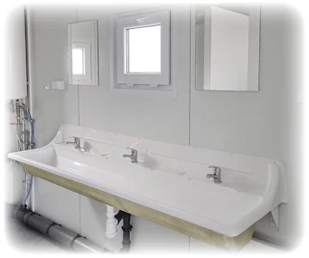 Sanitärcontainer MS20 von Mobilbox von innen mit Waschbecken