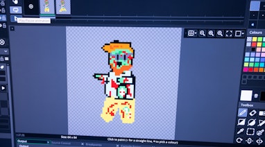 Computerbildschirm mit verpixelter Figur in Programm
