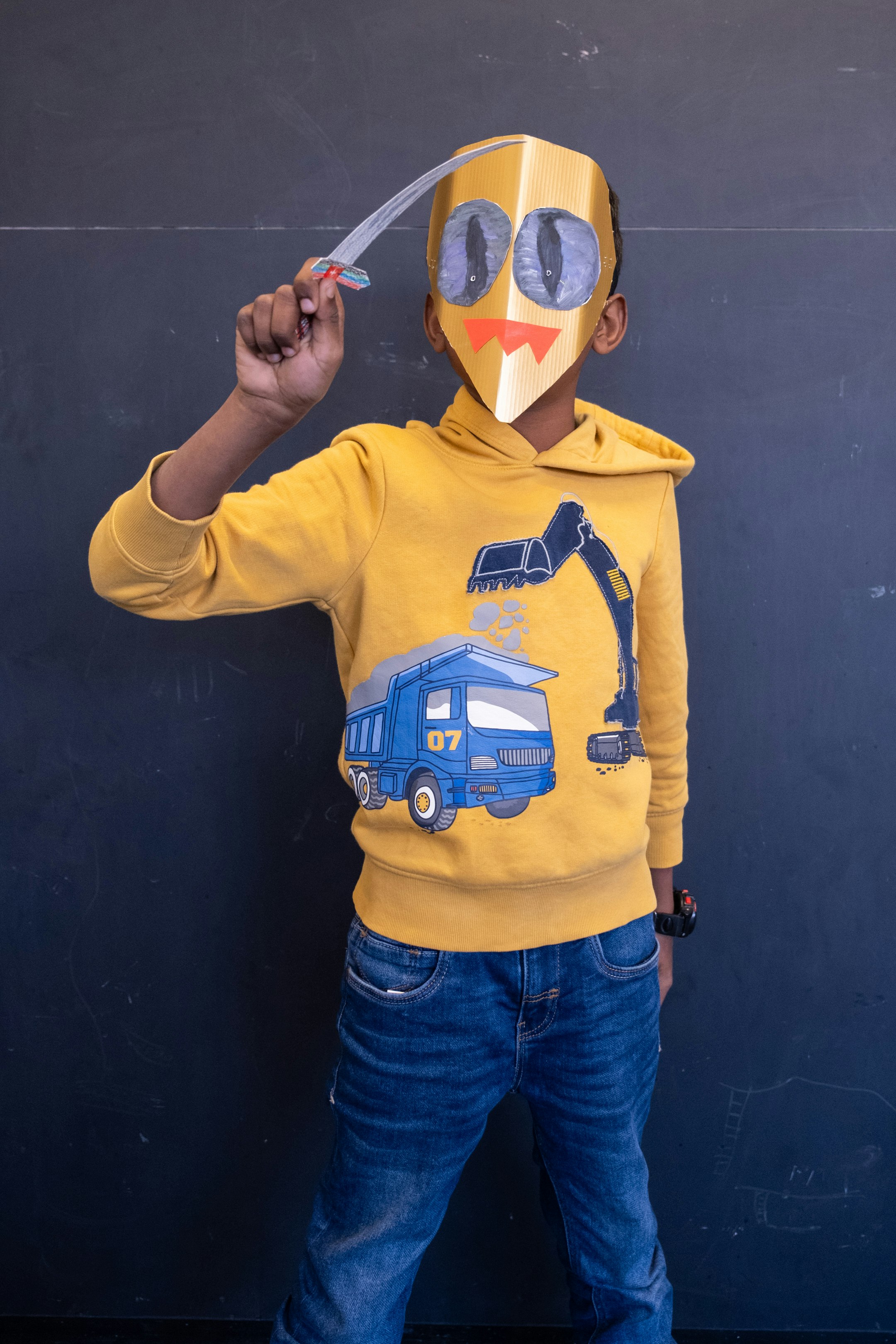 Kind mit Maske