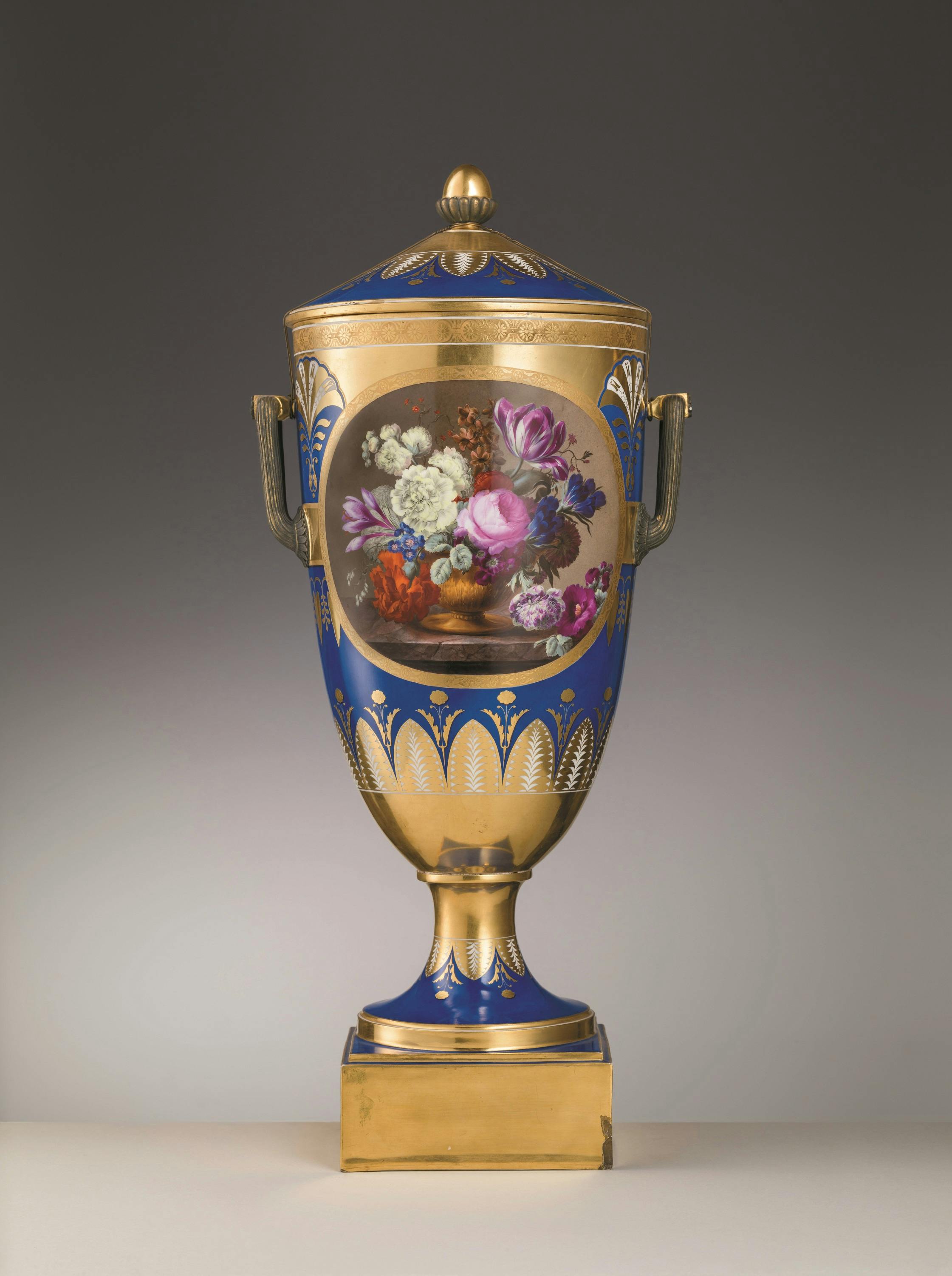 Pair of two-handled vases with lid