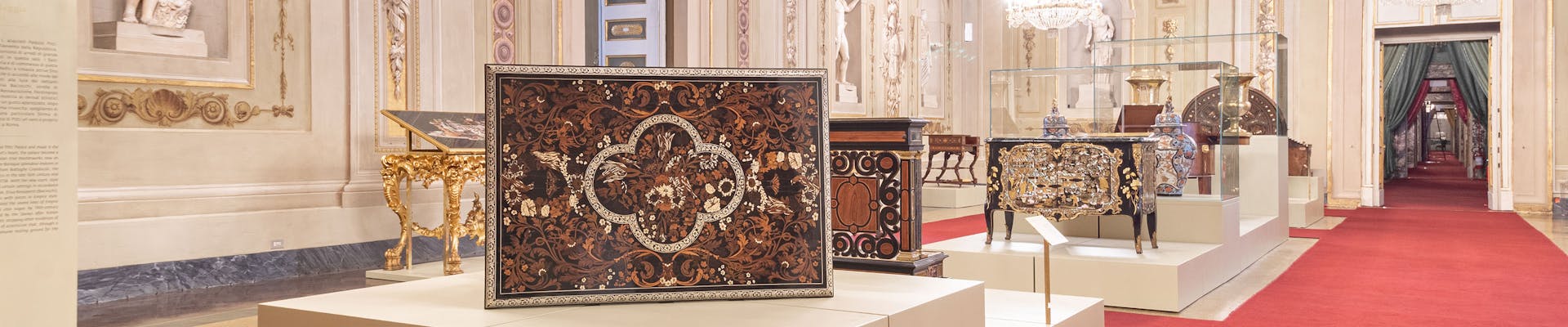 The Hall of Niches in Palazzo Pitti with an exhibition of furniture The Hall of Niches in Palazzo Pitti with an exhibition of furniture
