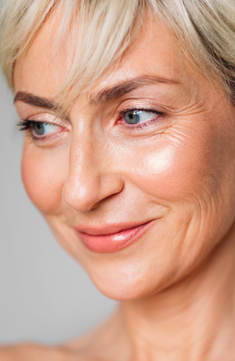 Close-up of an older woman looking to the side