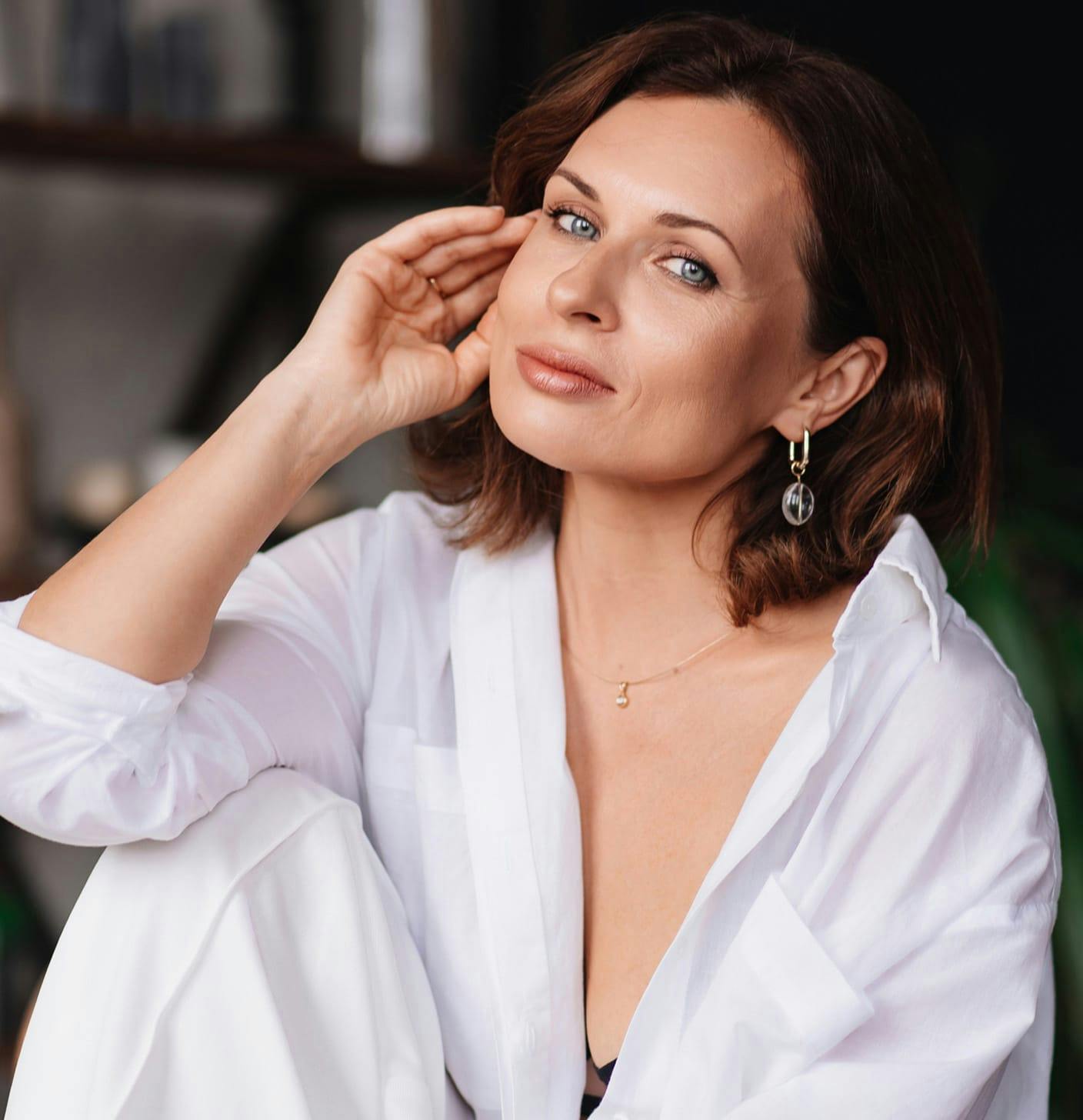 Woman with her hand to her face