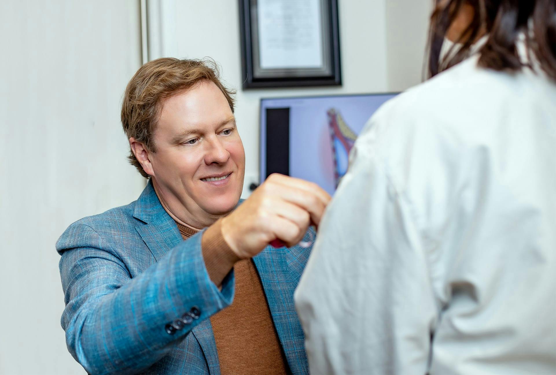 Dr. Haydon working with a patient