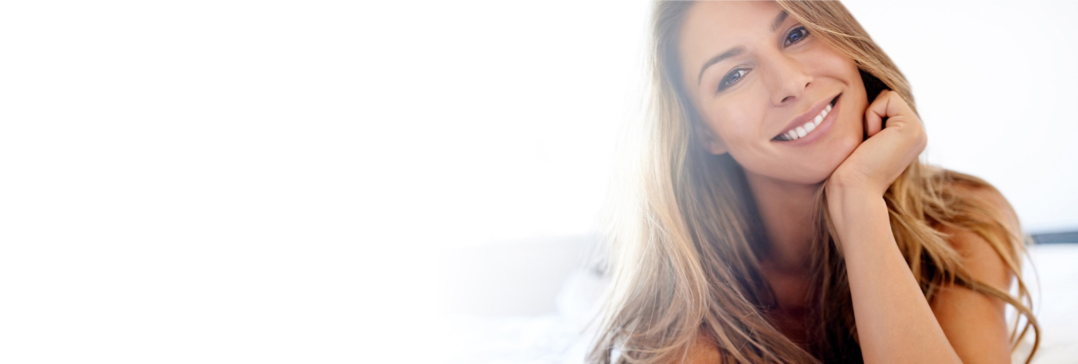 Woman resting her face on her hand