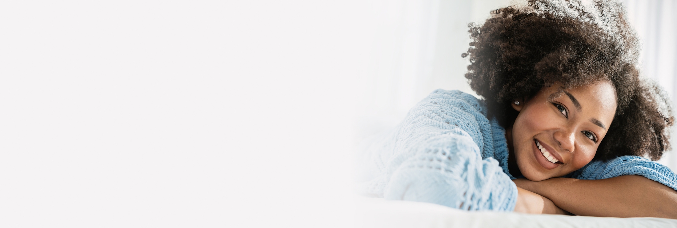 Woman in a blue knitted sweater