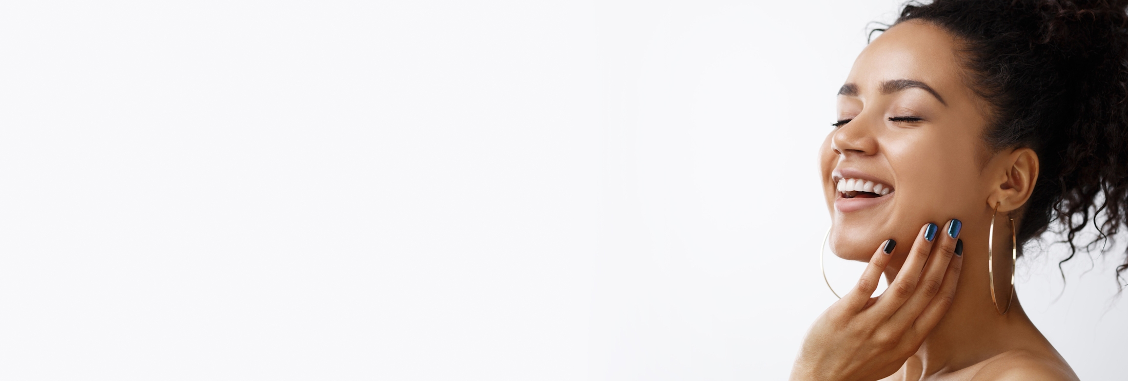 Woman touching her face