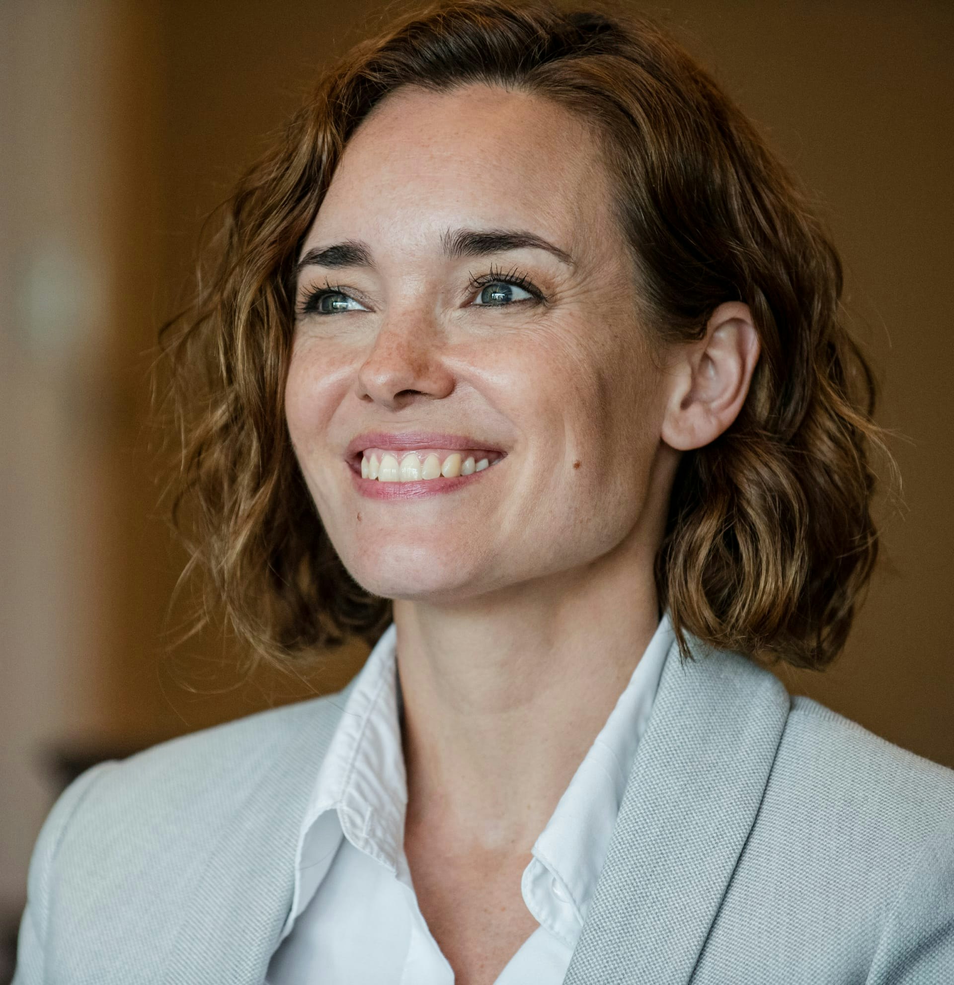 woman with short curly hair