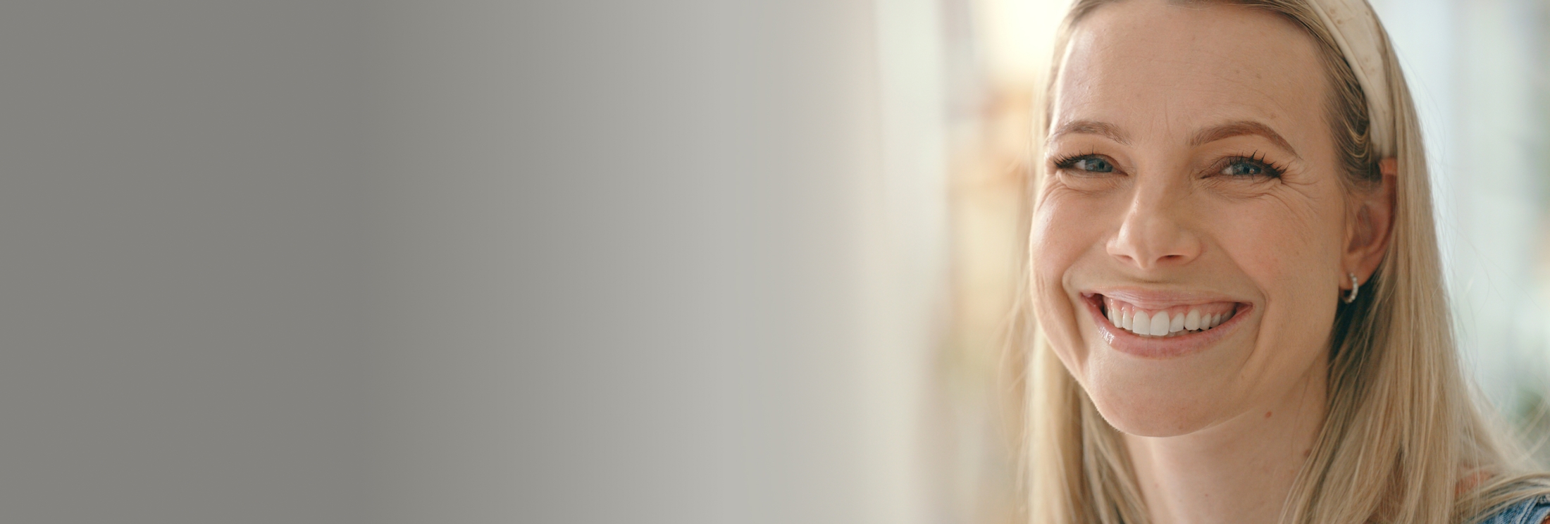 woman with blonde hair smiling