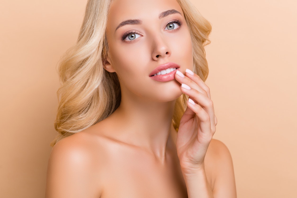 Blonde woman with lip augmentation