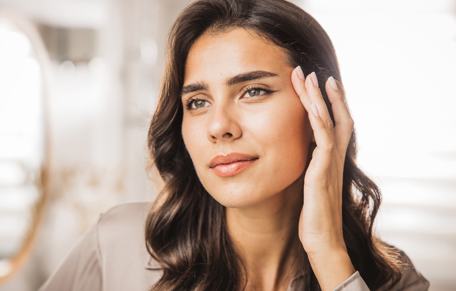 Woman touching her face