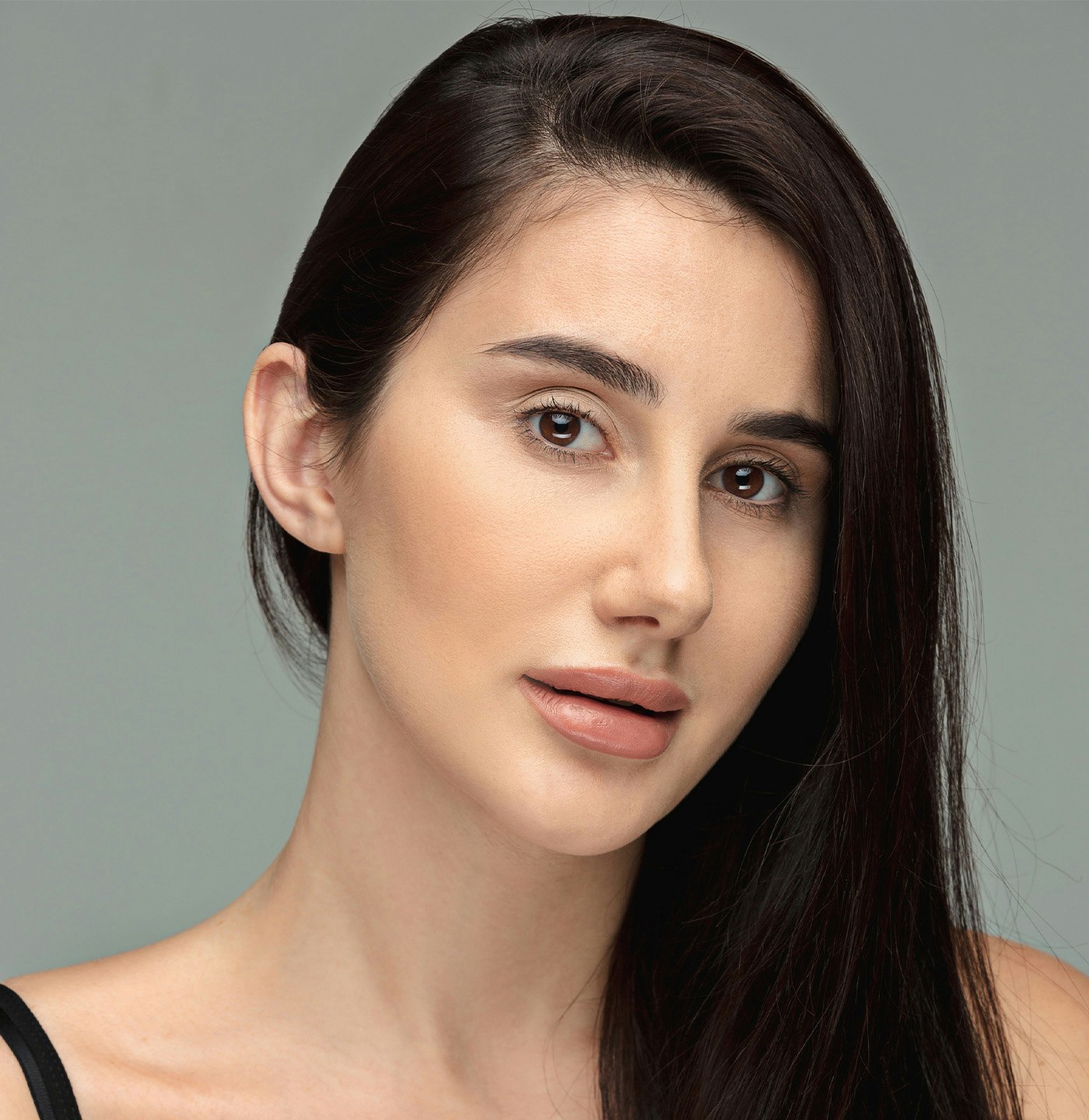 Woman with her hair pulled to the side