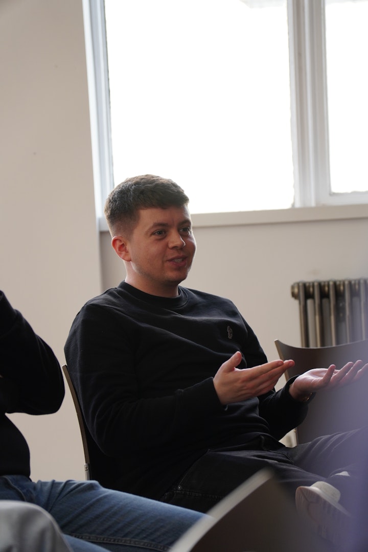 MarCloud team member Sam in the office talking about ROI