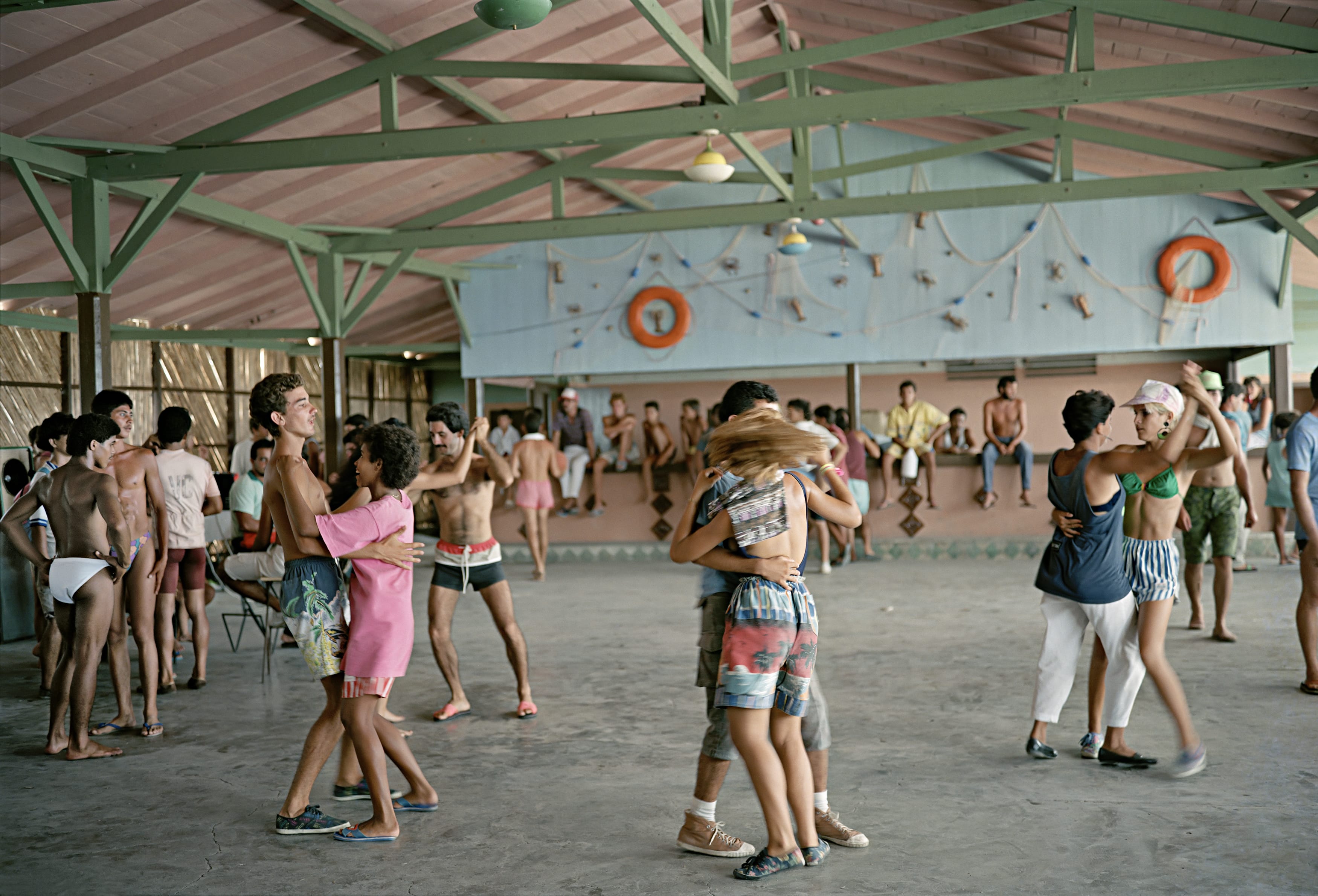 Kids dancing on a summer afternoon at a seaside pavilion in Isabela de Sagua, in the Holguin province, in 1993. Another of the most iconic images from the series.