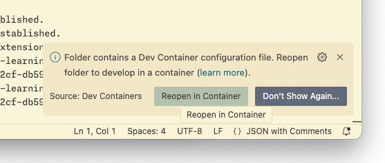 Reopen in Container button in VS Code
