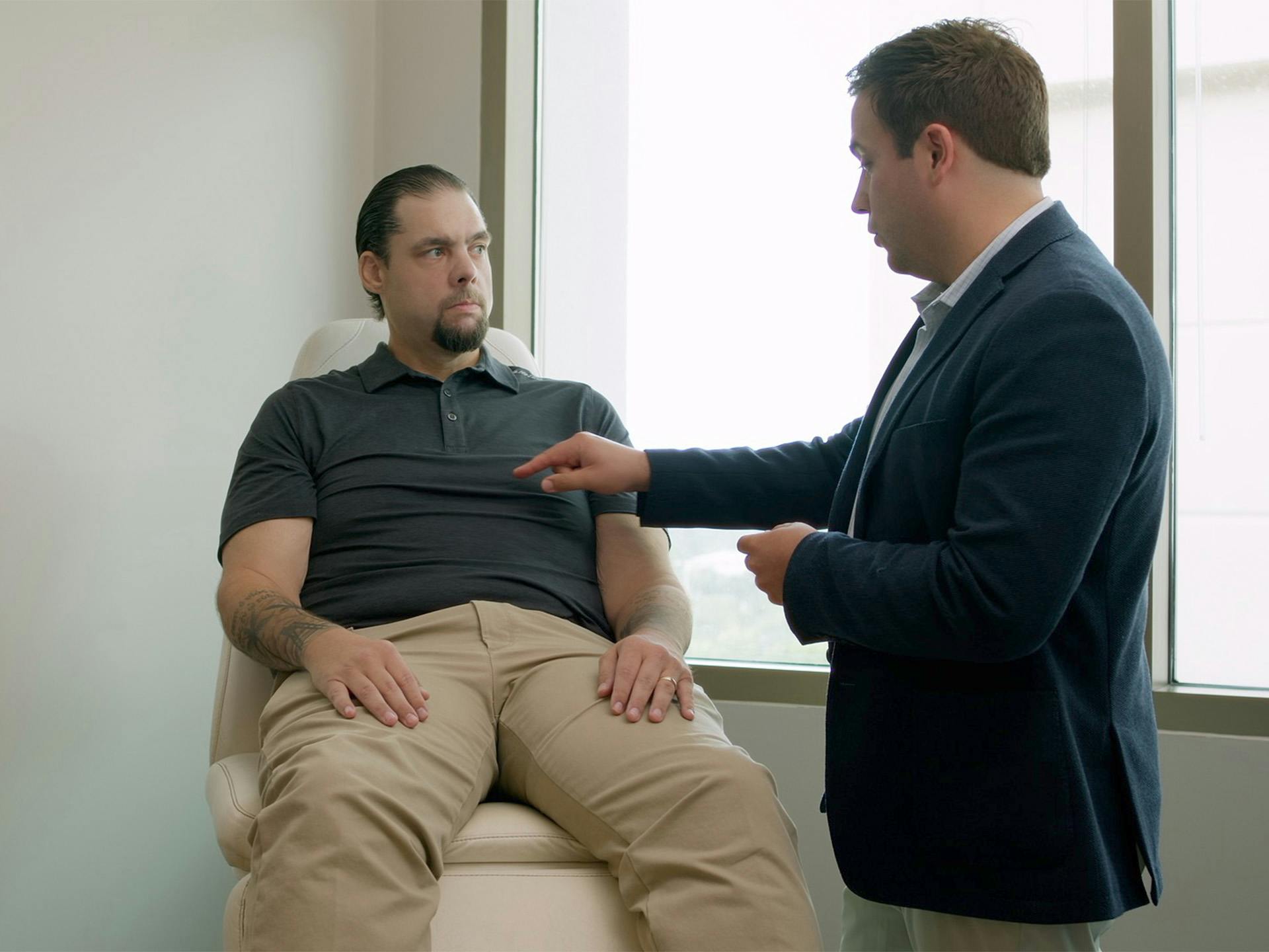 Man sitting down having consultation with doctor
