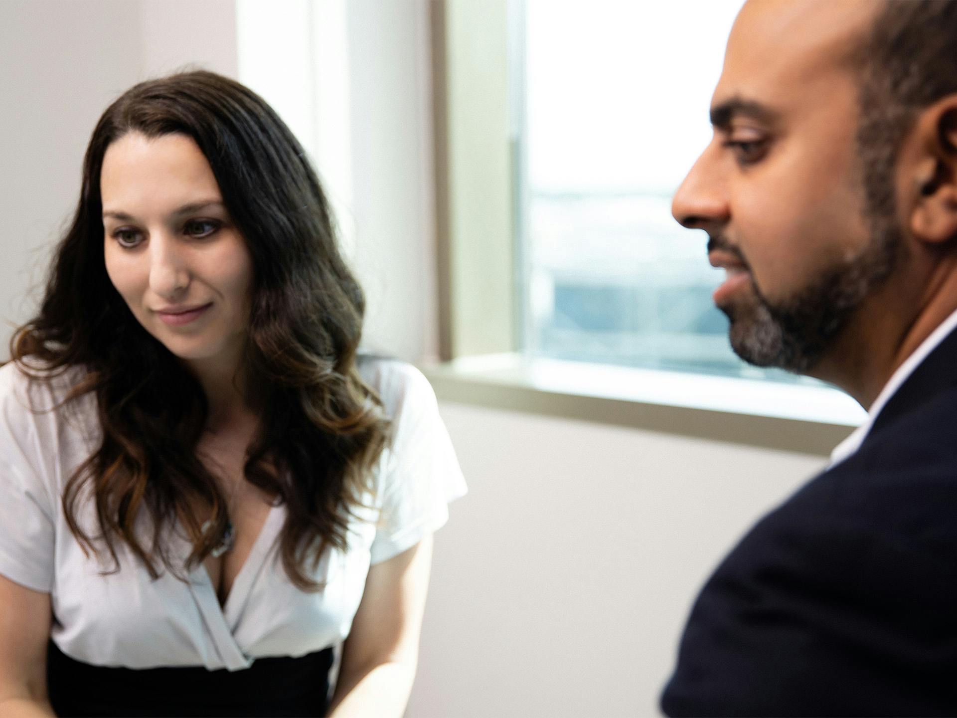 Doctor talking to female patient