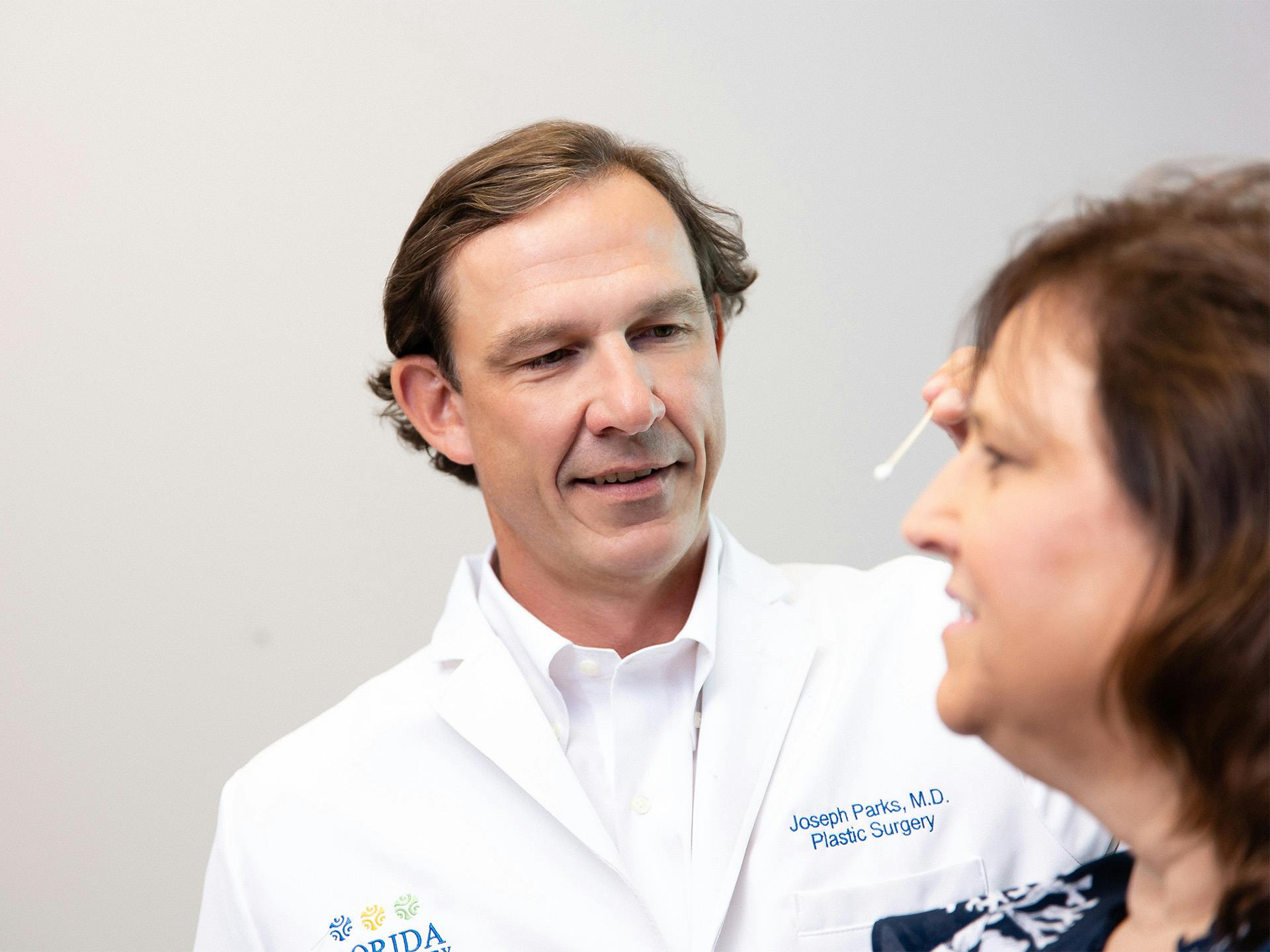 Dr. Joseph Parks with female patient