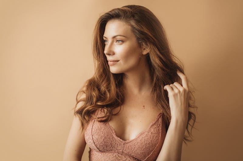 Woman in a bra in studio shoot
