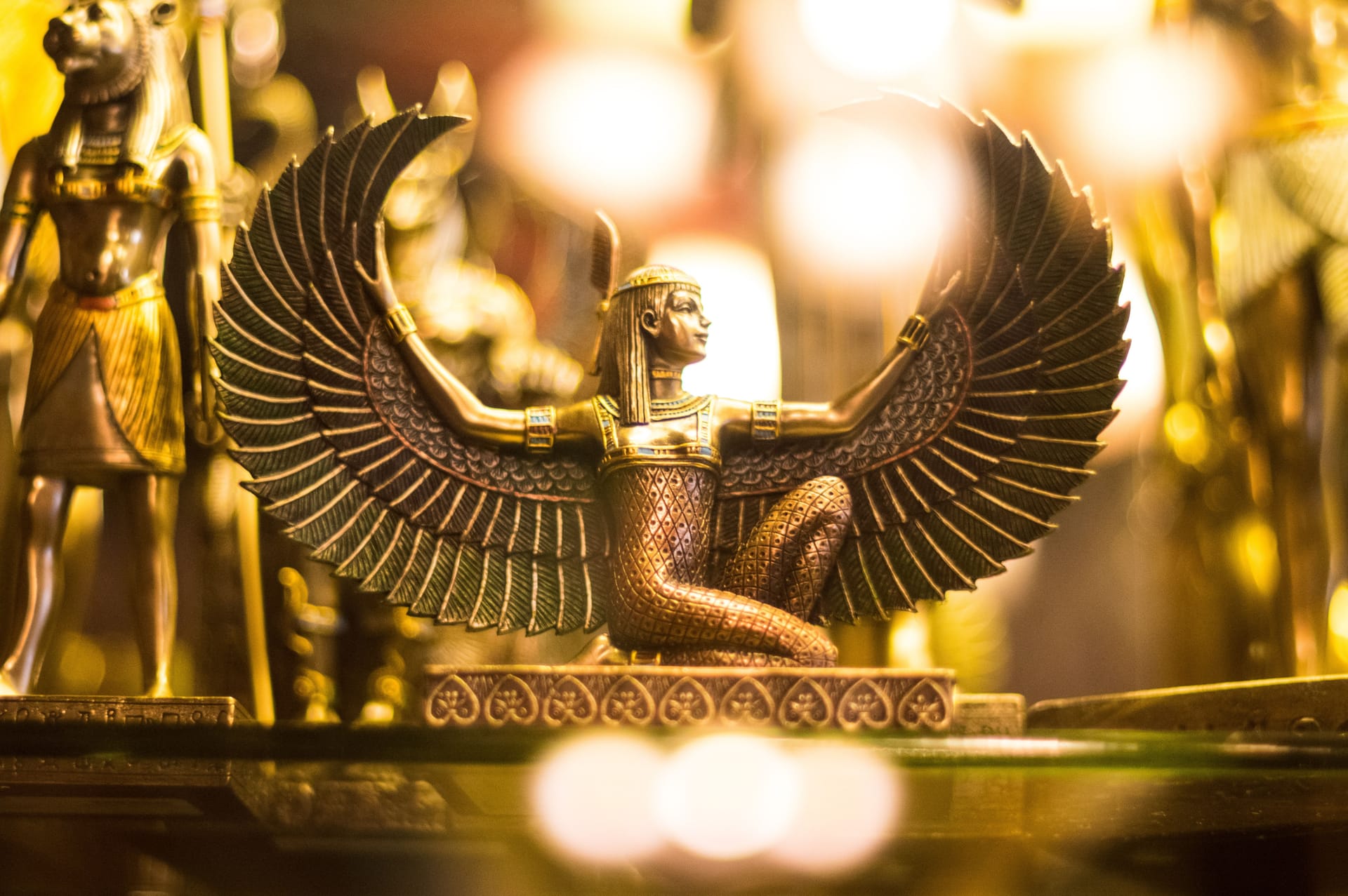 Ornate gold statue of Egyptian goddess, Isis.
