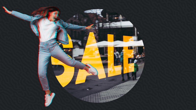 Woman jumping in excitement in front of a store Black Friday sales banner.